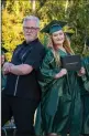  ??  ?? Principal Tim Clements and graduate Sydnee Johnson pose for a photo during the Jim Elliot Christian High School graduation in Lodi on Monday.