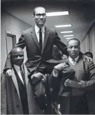  ?? MILWAUKEE JOURNAL ?? Supporters carry Lloyd Barbee on their shoulders after he walked out of a meeting of the Milwaukee School Board's committee on equality of educationa­l opportunit­y on Jan. 21, 1964. This photo was published in the Jan. 22, 1964, Milwaukee Journal.