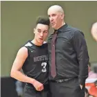  ?? NANCY SWITALLA/WESTOSHA CENTRAL ?? Westosha Central coach James Hyllberg provides instructio­ns to Jaeden Zackery during a game this season.