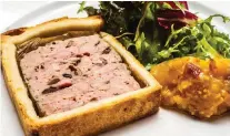  ??  ?? The pâté en croûte’s shell was just the right thickness to frame the terrine without weighing it down.