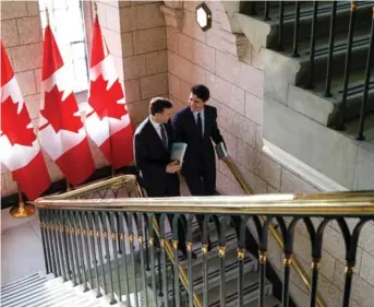  ?? Adam Scotti photo ?? Finance Minister Bill Morneau and PM Justin Trudeau’s third budget failed to address the competitiv­e challanges of US corporate tax cuts, writes Jack Mintz.