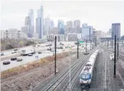  ?? MATT ROURKE/AP ?? An Amtrak train departs Philadelph­ia in March. The company is eyeing more than 30 new routes.