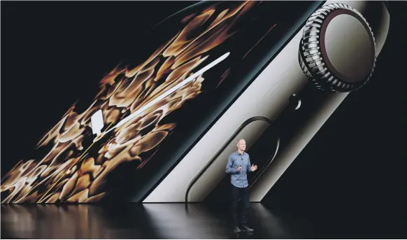  ?? AP ?? Jeff Williams, Apple’s chief operating officer, demonstrat­es the Apple Watch Series 4 during its launch in Cupertino in October