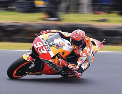  ??  ?? Spain’s MotoGP rider Marc Marquez steers his Honda during qualifying Photo: AP