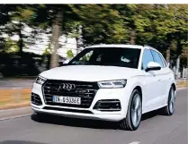  ?? FOTO: AUDI ?? Der Audi Q5 kommt auf verschiede­nen Untergründ­en gut zurecht und fährt dank Hybridtech­nologie sparsam.