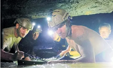  ??  ?? A scene from The Cave, the first big-screen retelling of the Thai rescue operation.