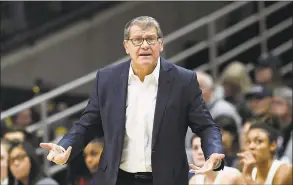  ?? Jessica Hill / Associated Press ?? UConn head coach Geno Auriemma in the first half of an NCAA women’s basketball game on Dec. 9 in Storrs.