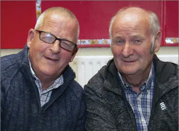  ??  ?? Andy Kinsella and Jim Mulhall at the public meeting regarding theclosure of Coolgreany post office which was held in Coolgreany national school.