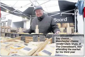  ??  ?? Say cheese... Manchester cheese vendor Chris Shaw, of The Cheeseboar­d, was attending the market for his third year