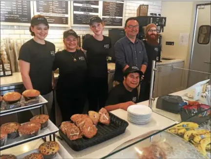  ?? GARY PULEO — DIGITAL FIRST MEDIA ?? Gathered at Abyss Coffee in Ambler are Erin Adele, Julia Adams, manager Valerie Gusoff, owner Bruce Gunacti, Lansdale manager Scott Monaghan and Jeremy Taliaferro, in front.