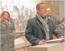  ?? FRAN
SPIELMAN/SUN-TIMES ?? Richard Juarez, a candidate for 22nd Ward alderman, renews his demand for the immediate resignatio­n of Ald. Ricardo Munoz (22nd). Juarez is flanked by aldermanic candidates Liz Lopez (left) and Neftalie Gonzalez (right).