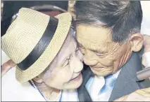  ?? LEE JI-EUN YONHAP VIA AP ?? South Korean Lee Keumseom, 92, left, hugs her North Korean son, Ri Sang Chol, 71, during the Separated Family Reunion Meeting in North Korea on Monday.