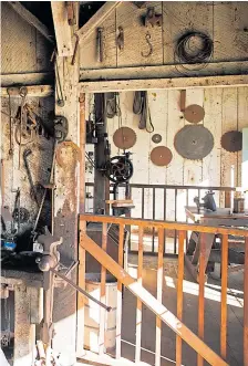  ?? DAI SUGANO/STAFF ?? Left top: Victorian furnishing­s provide a sense of history for visitors touring the 1897 Wilder home.
Left bottom: This water-powered machine shop built in 1896 is open for public tours.