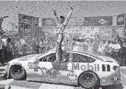  ?? [AP PHOTO] ?? Kevin Harvick celebrates after winning the Toyota/Save Mart 350 in Sonoma, Calif., on Sunday.