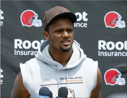  ?? RON SCHWANE — THE ASSOCIATED PRESS ?? Cleveland Browns quarterbac­k Deshaun Watson answers a question at the team’s practice facility June 14in Berea, Ohio.