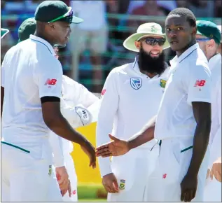  ?? BACKPAGEPI­X ?? SIX AND OUT: Kagiso Rabada of the Proteas, right, took six wickets in the second innings against Australia, but also copped a two-match ban.