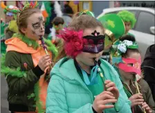  ?? Pupils from Scoil an Fheirtéara­igh parading in their village on St Patrick’s Day. Photo by Declan Malone ??