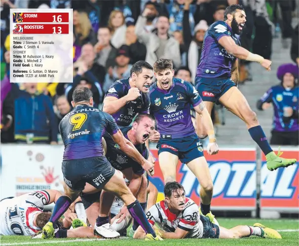  ?? Picture: AAP ?? Melbourne Storm players celebrate after Joe Stimson scores the match-winning try against the Sydney Roosters at AAMI Park last night