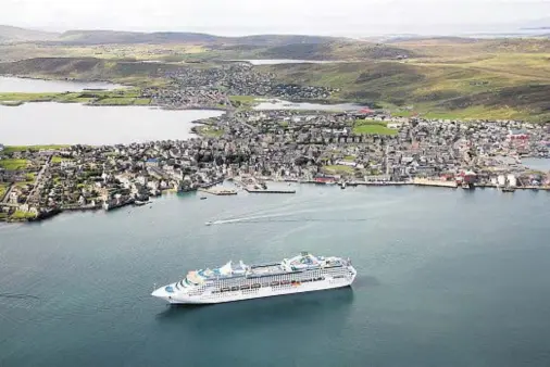  ??  ?? WELCOME GUEST: Lerwick Harbour with the Sea Princess – one of many vessels that have visited the port – at inner anchorage