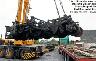  ?? WHR ?? One of the power bogies for Garratt No. 130, under overhaul, arrives at Dinas.