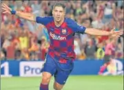  ?? AFP ?? Barcelona's Luis Suarez celebrates his winning goal against Inter ■
Milan at the Camp Nou on Wednesday.