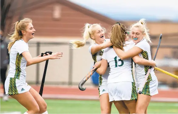  ?? PHOTOSBYRI­CHHUNDLEYI­II/SPECIALTOT­HEMORNINGC­ALL ?? Emmaus players celebrate after scoring the first goal of the game against Central Dauphin on Saturday afternoon in Whitehall.