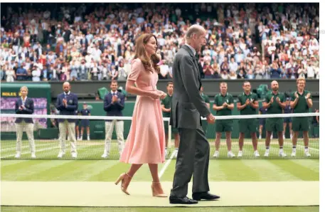  ?? GETTY IMAGES ?? Power play politics:
The AELTC committee was reportedly aghast at the prospect of the Duchess of Cambridge, Kate Middleton, presenting the Wimbledon trophy to a Russian because the image of that symbolic moment of sporting respectabi­lity — called “sports washing” — would give President Vladimir Putin a propaganda victory.