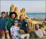  ?? CONTRIBUTE­D ?? Jeff Brown, back row, from left, Andrew Brownstone, Derek Steveson along with Pierce Brownstone, front row from left, Alden Brownstone relax after a hard day building a sand sculpture at Capitola Beach on Oct. 3.