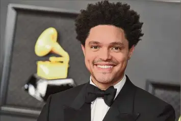  ?? Jordan Strauss / Associated Press file photo ?? Trevor Noah is hosts the Grammy Awards on Sunday in Los Angeles for a third-straight year.
