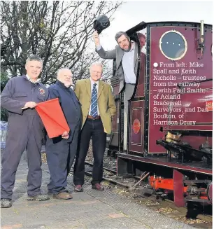  ??  ?? From left: Mike Spall and Keith Nicholls – trustees from the railway – with Paul Smith, of Acland Bracewell Surveyors, and Dan Boulton, of Harrison Drury