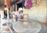  ?? ARUN SHARMA/HT ?? Johri Lal, brother of Bhagwati Prajapati who died of hunger, does pottery for a living. Congress vicepresid­ent Rahul Gandhi visited the family in UP’s Nehri village in 2009.