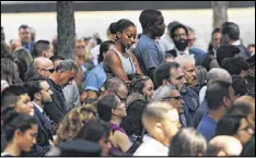  ?? SPENCER PLATT / GETTY IMAGES ?? A ceremony is held for victims of the Sept. 11, 2001, terrorist attacks at the National September 11 Memorial and Museum in New York City on the 15th anniversar­y of the attacks earlier this month.