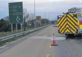  ??  ?? Emergency services at the scene of the crash near the Summerhill roundabout last Friday.