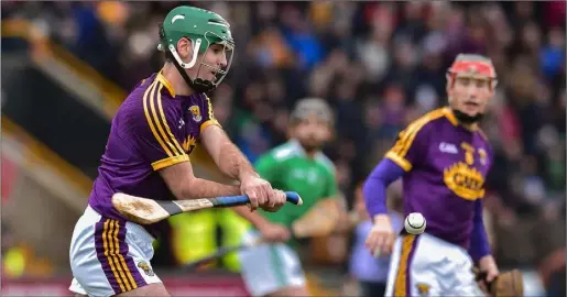  ??  ?? Wexford defender Shaun Murphy clearing his lines.