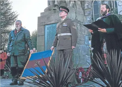  ?? Pictures: Rick Booth. ?? John McAulay, Lance Sergeant Alexander and the Rev James Reid at the unveiling of the commemorat­ive stone to Sgt John McAulay, who won the Victoria Cross for his bravery during the Battle of Cambrai 100 years ago.