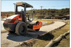  ?? NWA Democrat-Gazette/CHARLIE KAIJO ?? A constructi­on site is shown Sunday at Blowing Springs Trailhead in Bella Vista. NWA Trailblaze­rs is building a trail to extend the Razorback Greenway north near Bella Vista. It will have a connection to Blowing Springs Trail. Constructi­on has already...