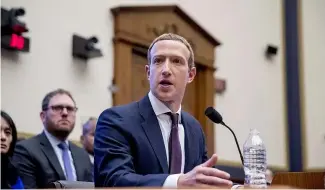  ?? ?? Facebook CEO Mark Zuckerberg testifies before a House Financial Services Committee hearing on Capitol Hill in Washington