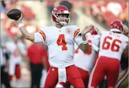  ?? JED JACOBSOHN — THE ASSOCIATED PRESS FILE ?? Kansas City Chiefs quarterbac­k Chad Henne (4) passes against the San Francisco 49ers during a preseason game in last August. If all goes according to plan on Sunday, the only time football fans will see Kansas City's Chad Henne or Philadelph­ia's Gardner Minshew during Super Bowl 57 is on the sideline, holding a clipboard, talking on a headset or offering encouragem­ent to teammates. But this is the NFL. Sometimes — actually, lots of times — things don't go according to plan.