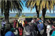  ?? ?? Buddhist faith leaders and community members gather during the “May We Gather” pilgrimage March 16 in Antioch.