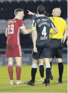  ??  ?? GAME OVER Aberdeen’s Lewis Ferguson is sent packing by referee Bobby Madden