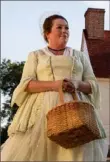  ??  ?? Elizabeth Keaney portrays a young Martha Washington at George Washington's Mount Vernon.