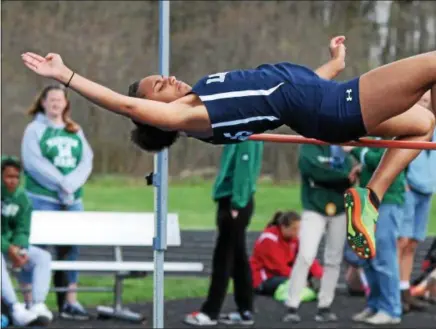  ?? RANDY MEYERS — THE MORNING JOURNAL ?? McKenzie Patterson of Lorain clears the bar during the girls high jump at the Vermilion Invitation­al.