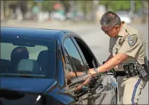  ?? ANDY HOLZMAN — LOS ANGELES DAILY NEWS FILE ?? During the previous maximum enforcemen­t period during Thanksgivi­ng week last year, 868people for driving under the influence of alcohol or drugs and 33people died on roads within CHP jurisdicti­on across the state.