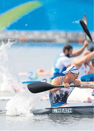  ??  ?? Britain’s Liam Heath beats Maxime Beaumont of France to win the final of the men’s K1 200m final
