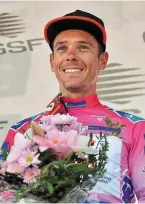  ?? | PHOTO : AFP ?? Philippe Gilbert, le rose lui va si bien.