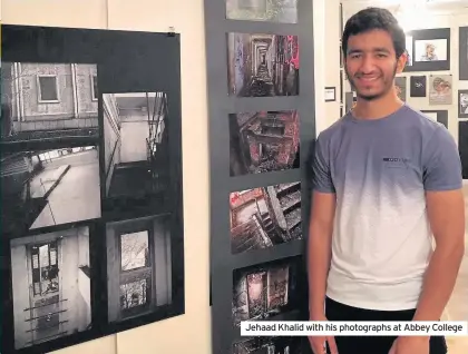  ??  ?? Jehaad Khalid with his photograph­s at Abbey College