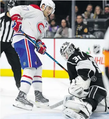  ?? — THE ASSOCIATED PRESS ?? Montreal Canadiens left winger Max Pacioretty scores on Kings goalie Peter Budaj during the overtime shootout in game Sunday.