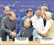  ?? PTI ?? Finance minister Arun Jaitley greets Himachal Pradesh chief minister Jai Ram Thakur during a prebudget meeting in New Delhi on Thursday. Tamil Nadu deputy CM O Panneersel­vam and MOS finance Shiv Pratap Shukla also attended the meeting