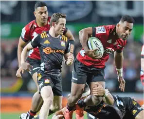  ??  ?? Crusaders wing Sevu Reece on attack with Brad Weber on his left during their match against Chiefs in Hamilton on August 1, 2020