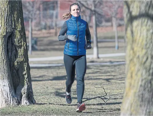  ?? RICK MADONIK TORONTO STAR ?? Toronto Star reporter Wendy Gillis goes for a run in Christie Pits Park, one of the many neighbourh­oods she’s explored over the years.